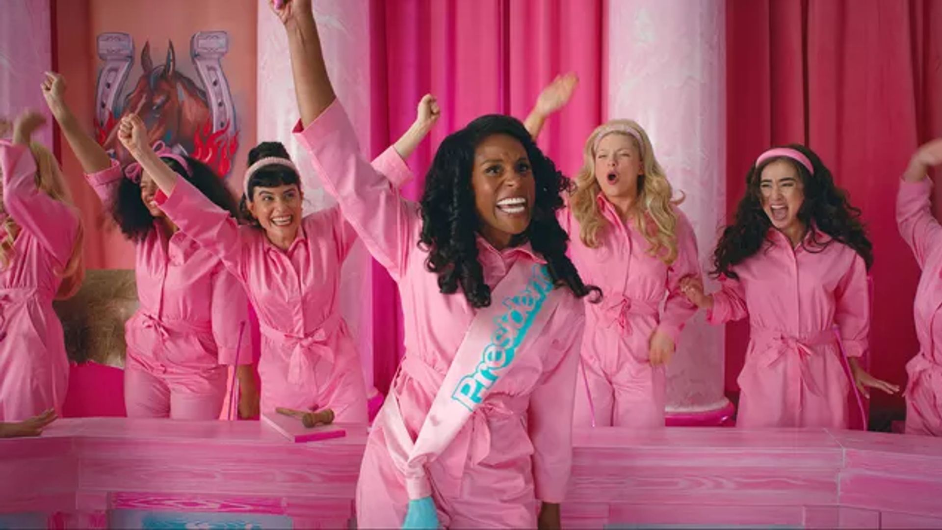 Issa Rae and other barbies wear pink boiler suits