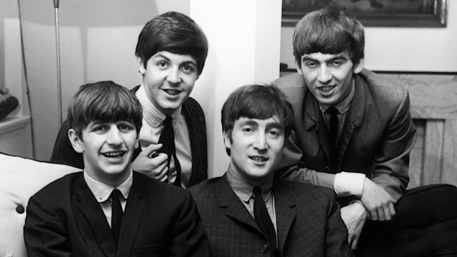 four men In suits 