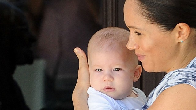 Duchess of Sussex Meghan hold her baby son Archie 