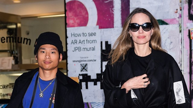 Pax Jolie-Pitt (L) and Angelina Jolie are seen in the East Village on December 28, 2023 in New York City.