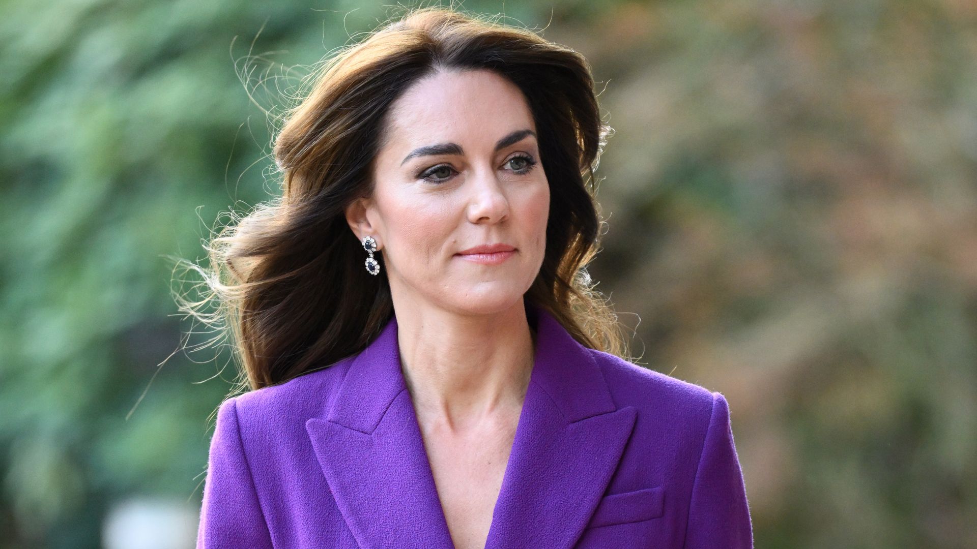 Kate in purple suit