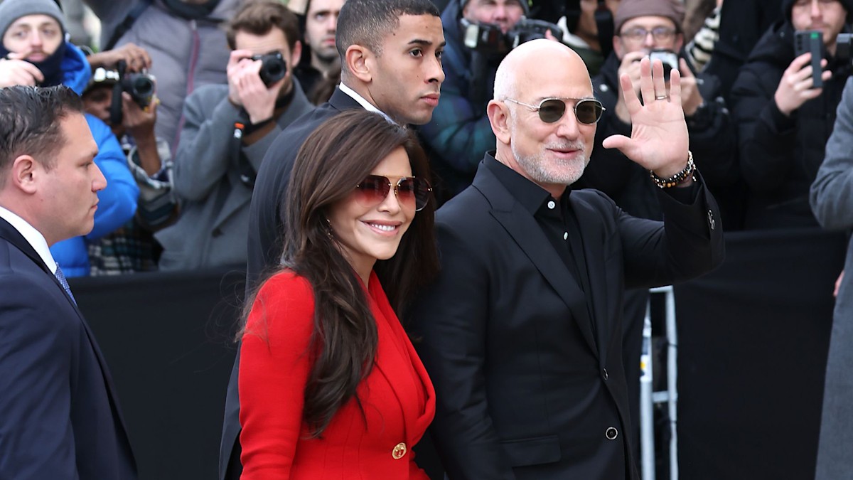 Jeff Bezos and wife Lauren are the picture of newlywed bliss as they storm the FROW of Paris Fashion Week