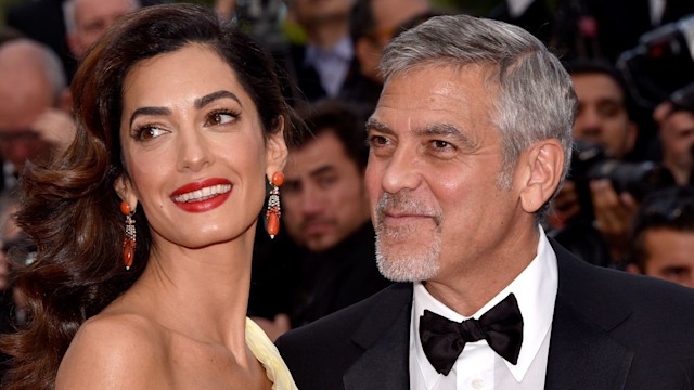 Actor George Clooney and his wife Amal Clooney attend the "Money Monster" premiere during the 69th annual Cannes Film Festival