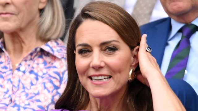 Kate Middleton brushes hair behind ear at Wimbledon