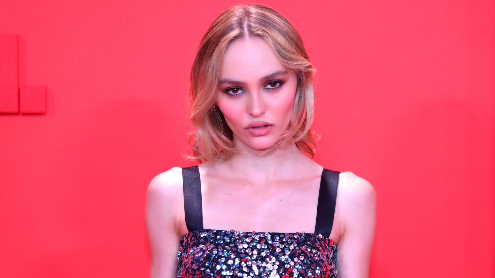 Lily-Rose Depp in a sequin dress on the red carpet in Cannes