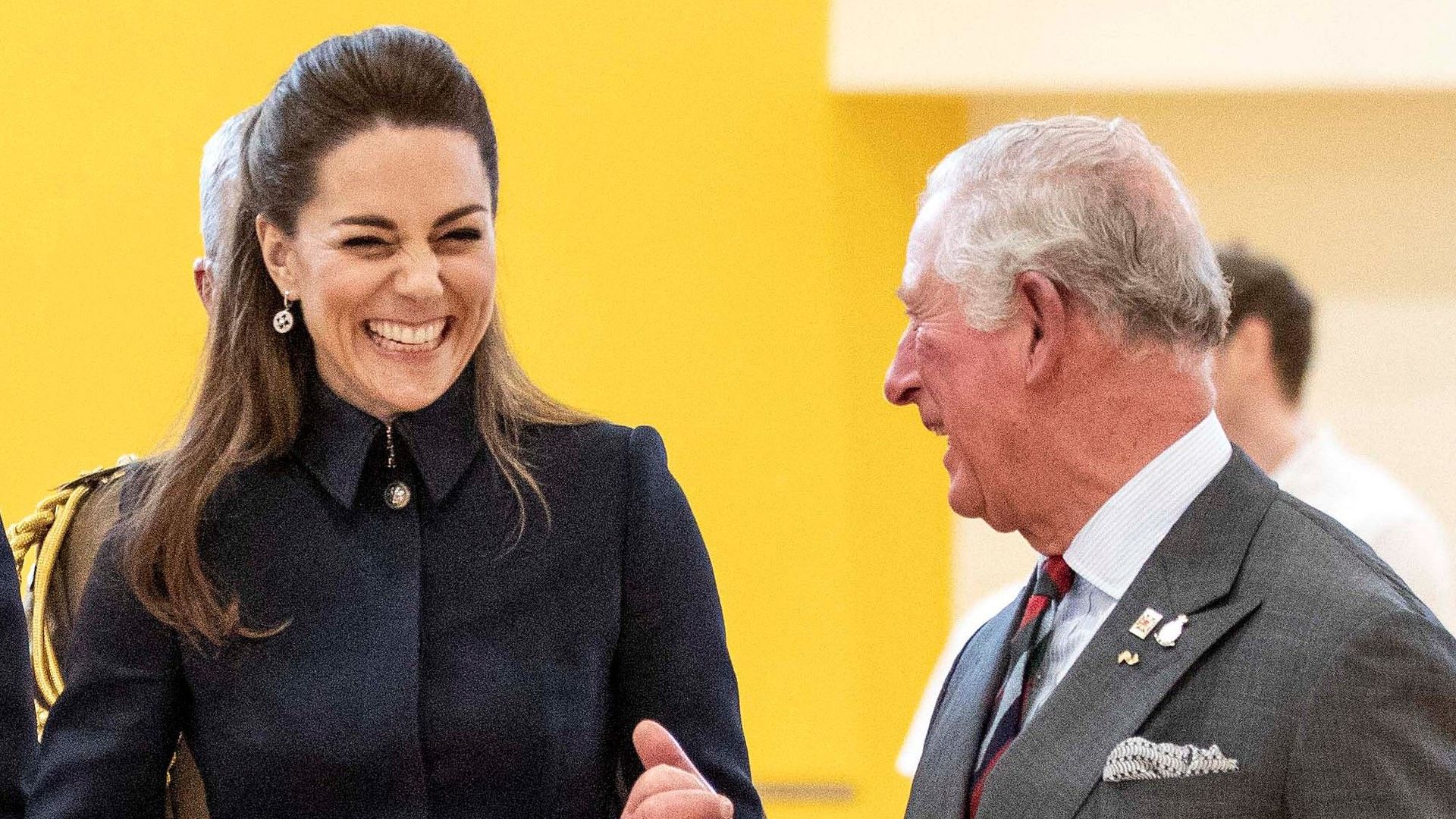 The then Prince Charles and Kate laughing during an event in 2020