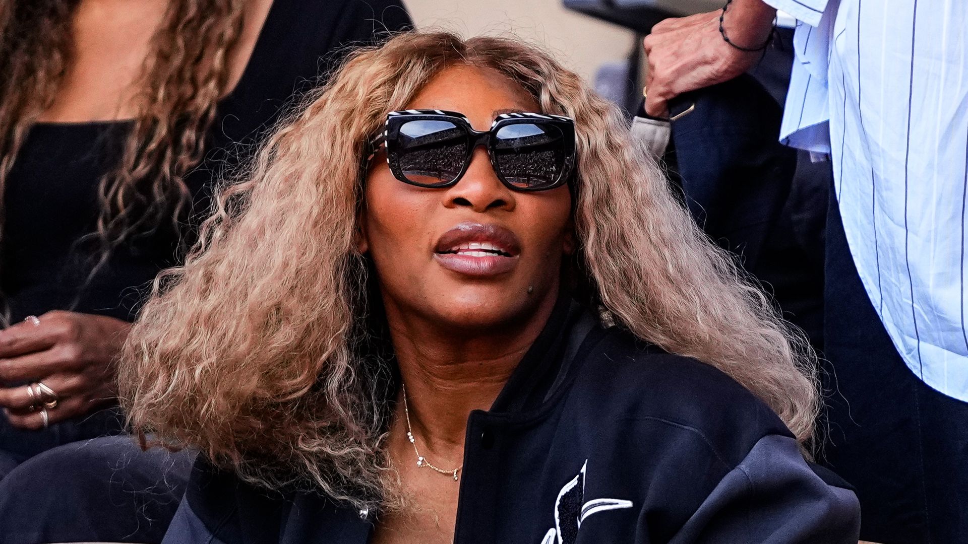 Serena Williams looks incredible with her natural curls at the Paris Olympics