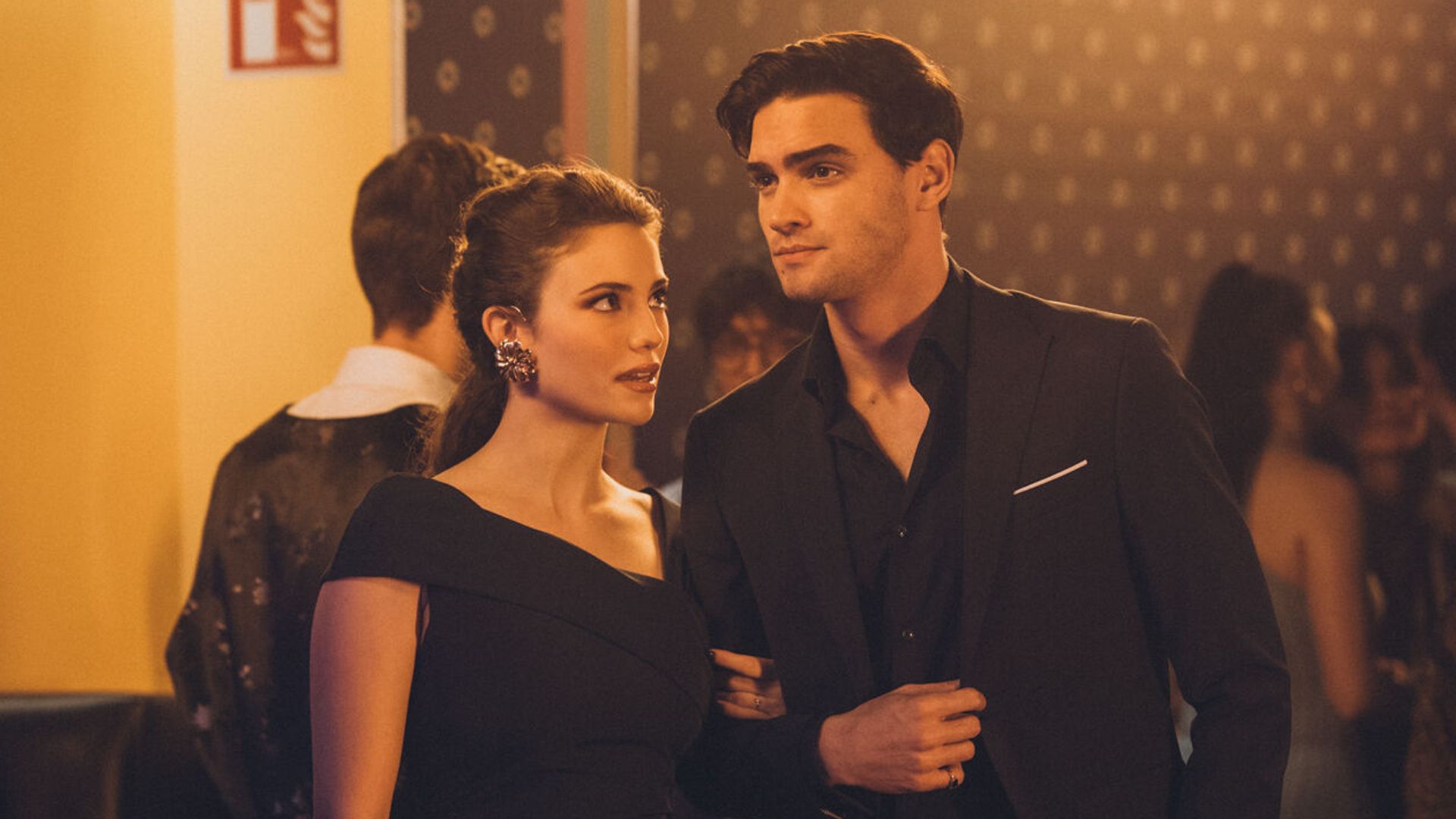 Nicole Wallace and Gabriel Guavara in formal attire in a scene from Our Fault