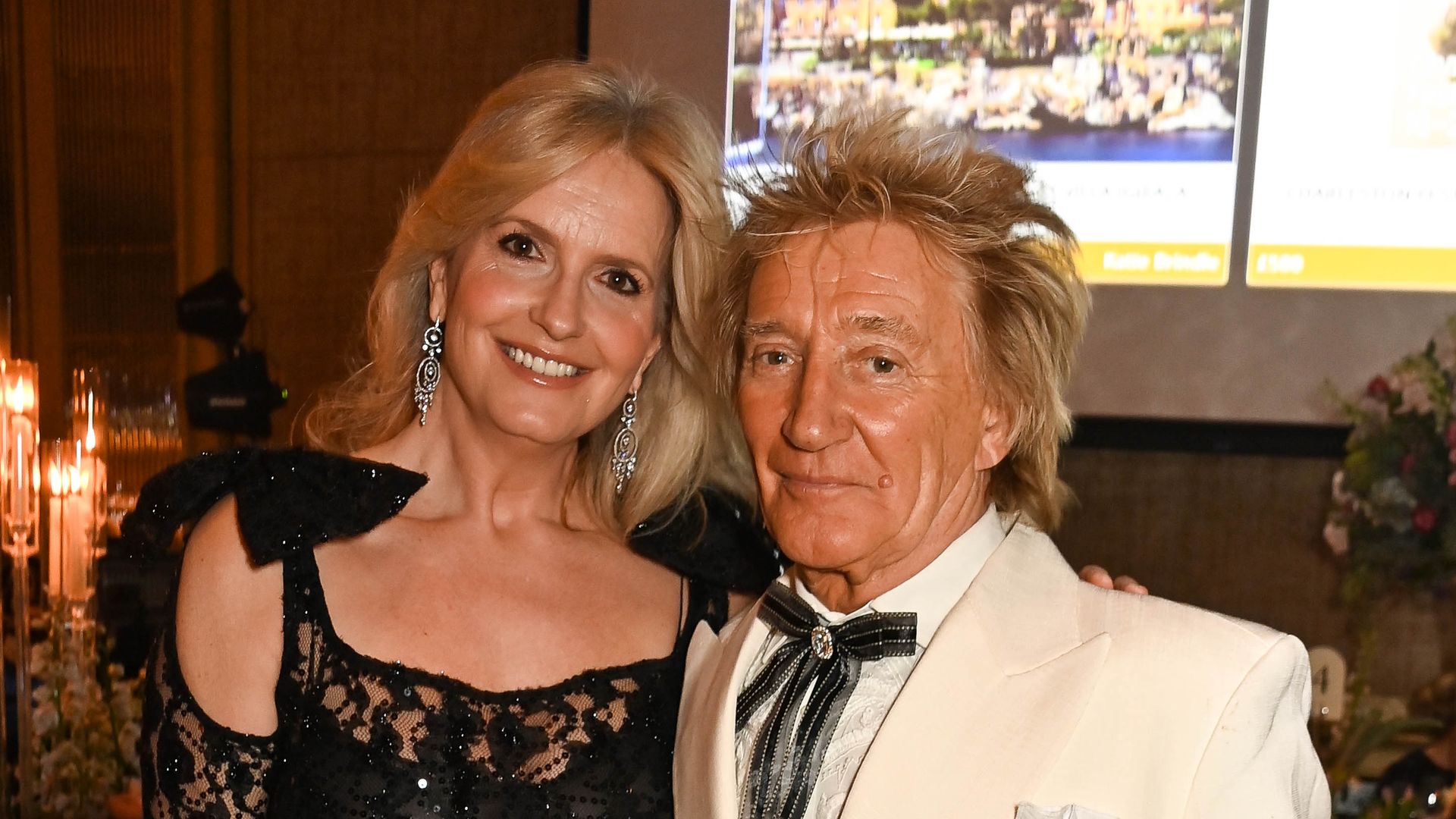 Penny Lancaster surprises in vampy glitterball dress to celebrate with King Charles