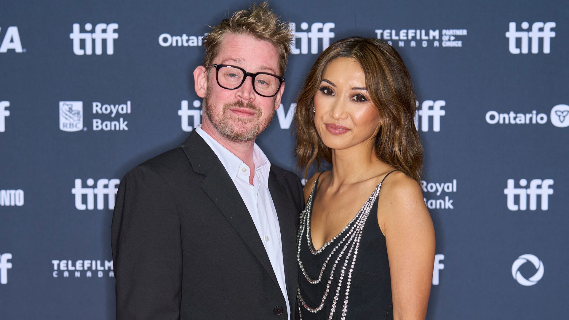 Macaulay Culkin looks besotted with fiancée Brenda Song in rare loved-up appearance