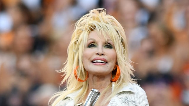 Dolly Parton performs during the college football game between the Georgia Bulldogs and the Tennessee Volunteers on November 18, 2023, at Neyland Stadium in Knoxville, TN