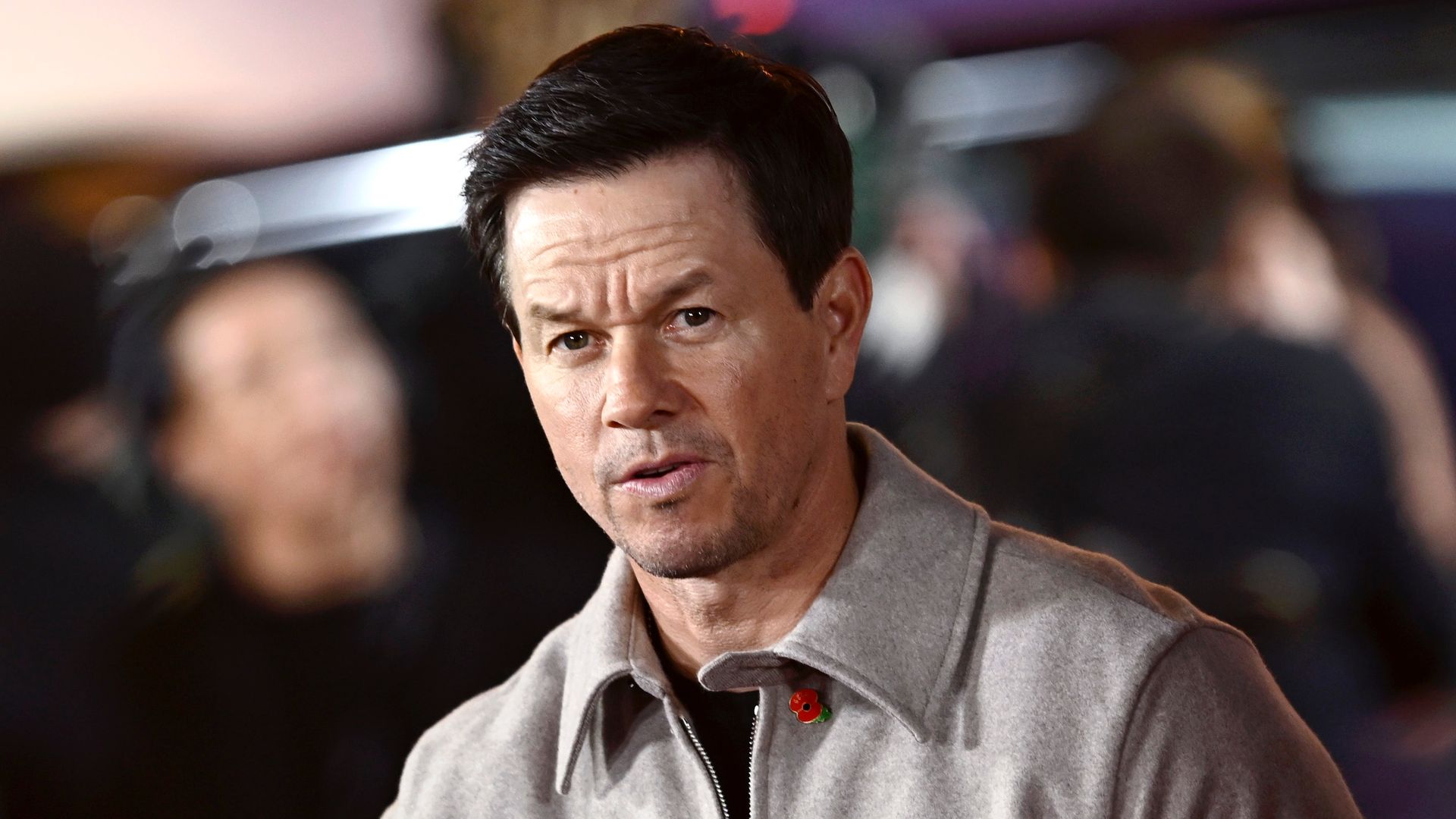 photo of mark wahlberg in grey jacket