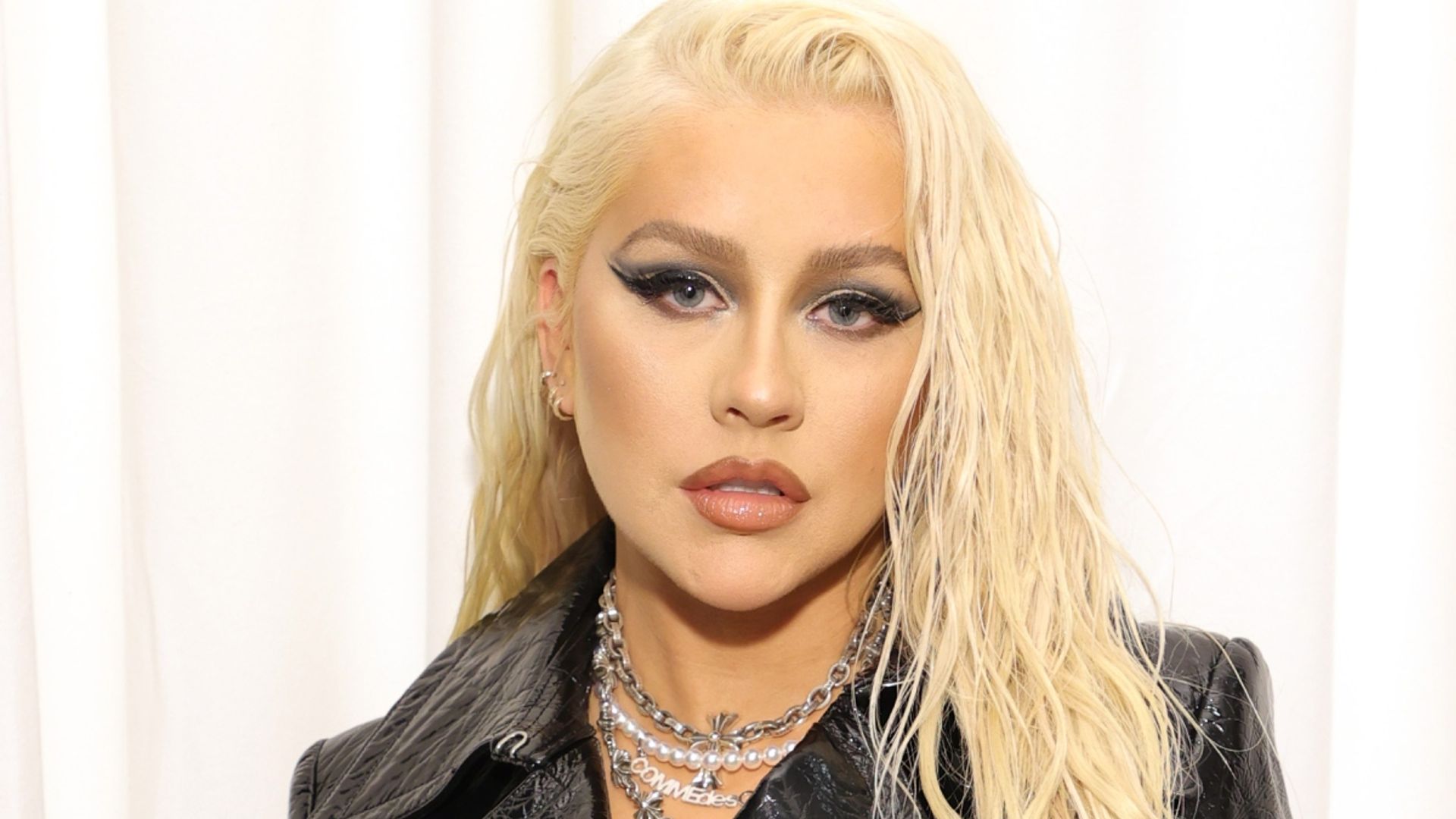 Christina Aguilera shows off her physique in skin-tight black