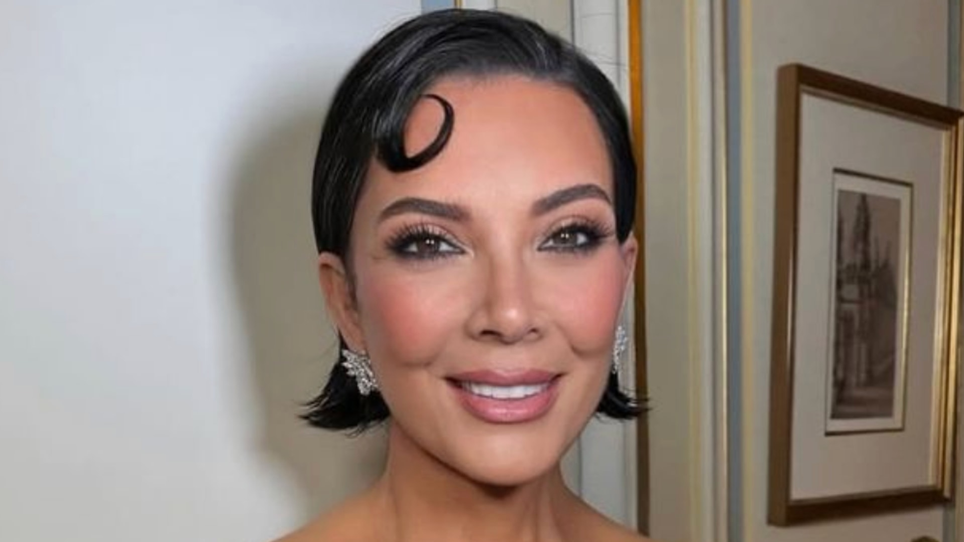 Kris Jenner posing in black dress in selfie