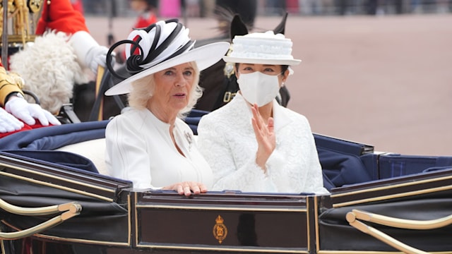 Queen Camilla with Empress Masako of Japan arriving at Buckingham Palace during the ceremonial welcome 