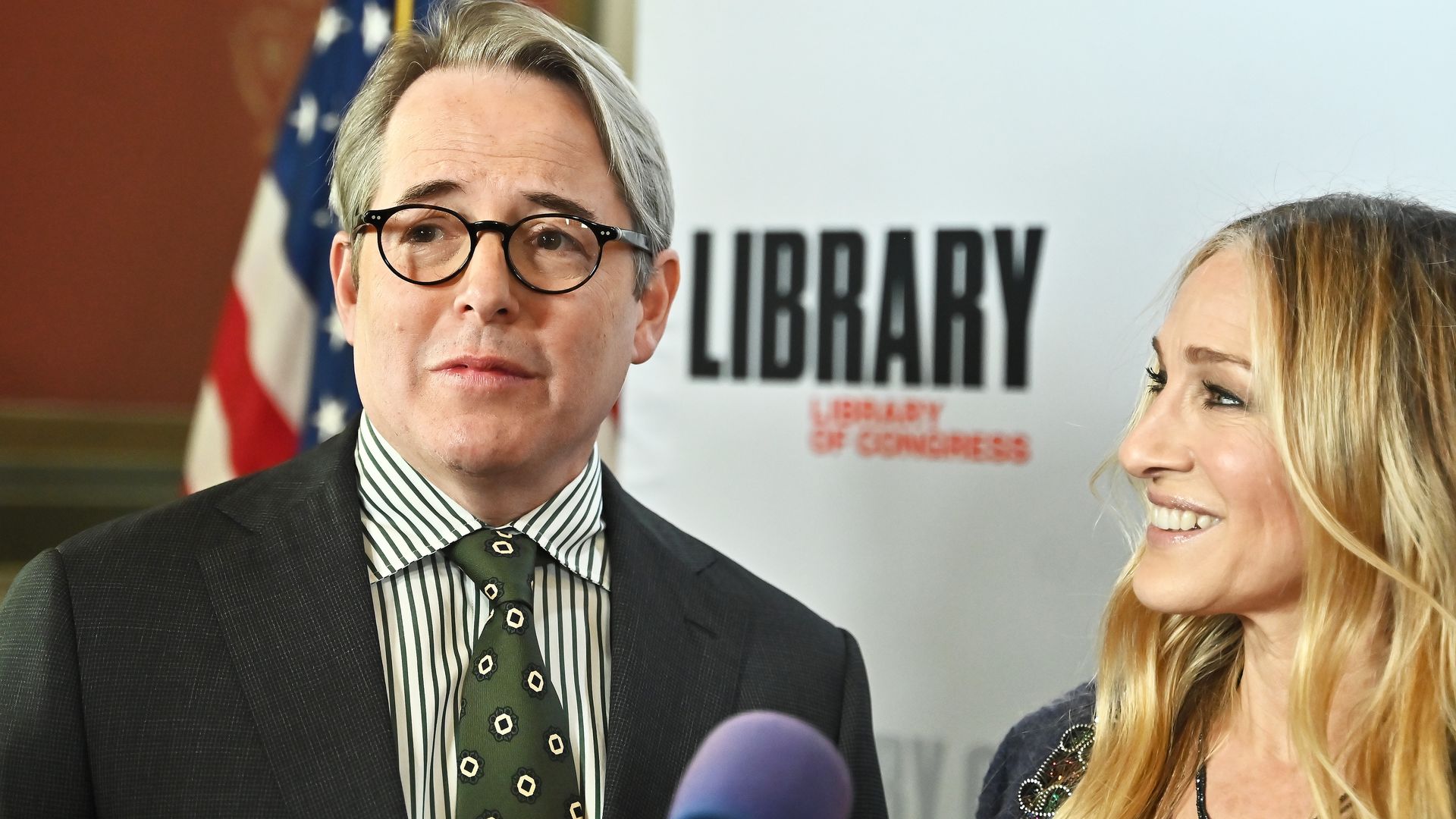 Matthew Broderick and Sarah Jessica Parker speaking at an event