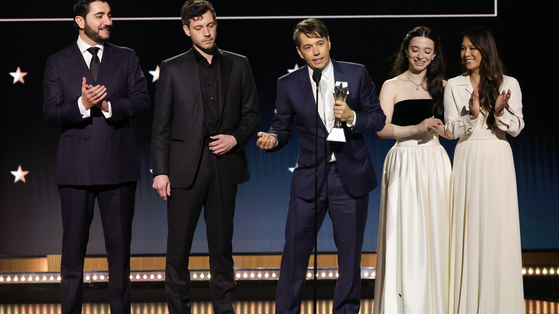 Vache Tovmasyan, Alex Coco, Sean Baker, Mikey Madison and Samantha Quan accept the Best Picture award for "Anora" onstage during the 30th Annual Critics Choice Awards at Barker Hangar on February 07, 2025 in Santa Monica, California.