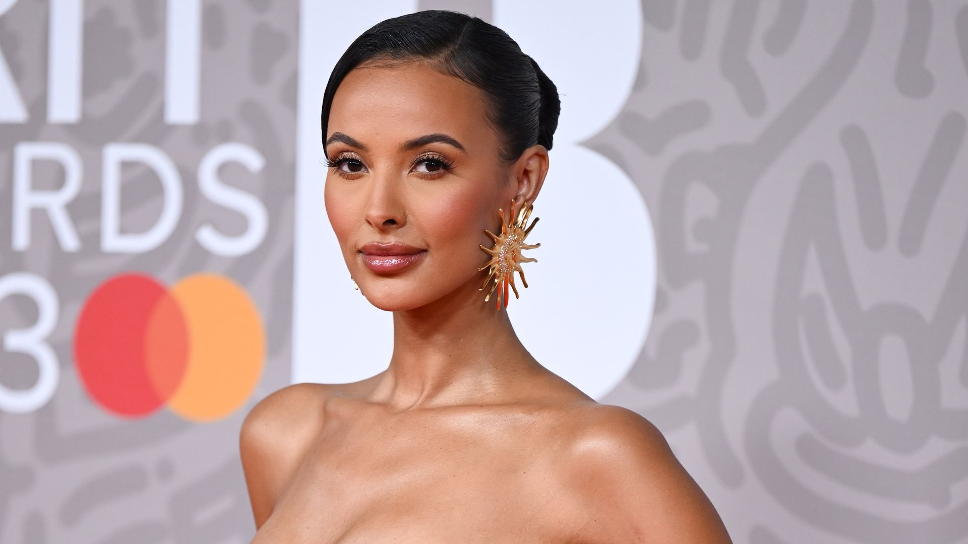 Maya Jama attends The BRIT Awards 2023 in schiaparelli dress