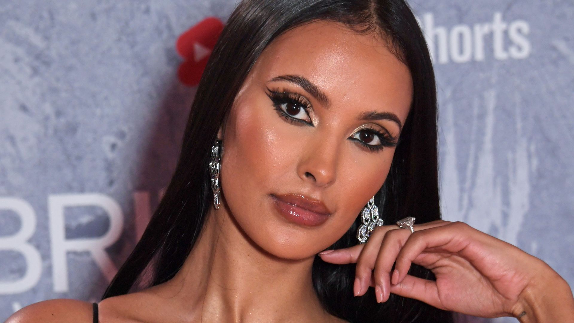 Maya Jama looks sensational in low-cut top and jeans after filming in  London