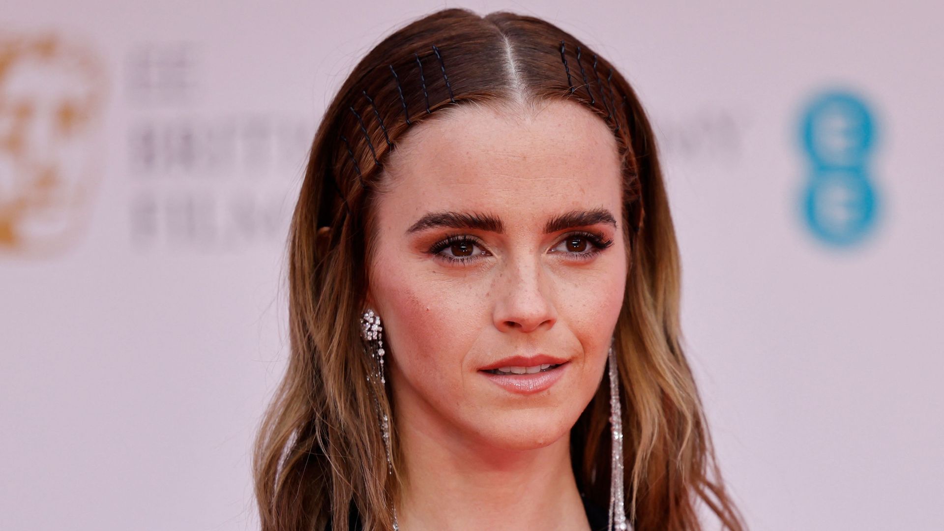 British actress Emma Watson poses on the red carpet upon arrival at the BAFTA British Academy Film Awards at the Royal Albert Hall, in London, on March 13, 2022