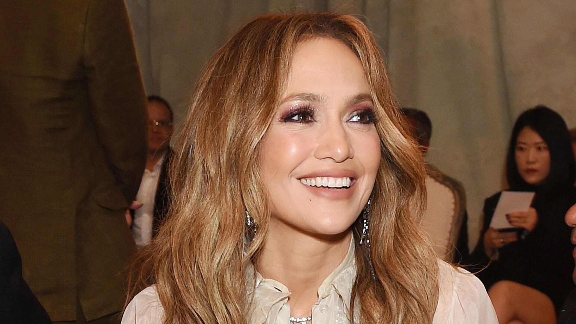 Jennifer Lopez is all smiles as she sits front row at the Ralph Lauren Spring 2024 Ready To Wear Fashion Show