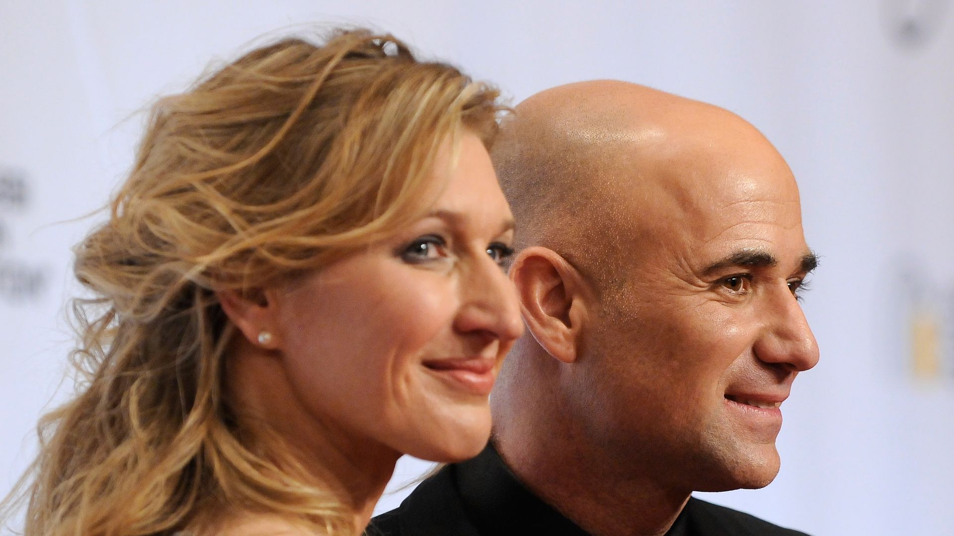 Andre Agassi and wife Steffi Graf cosy up in ultra-rare video