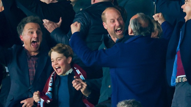 George and William cheering at Aston Villa match