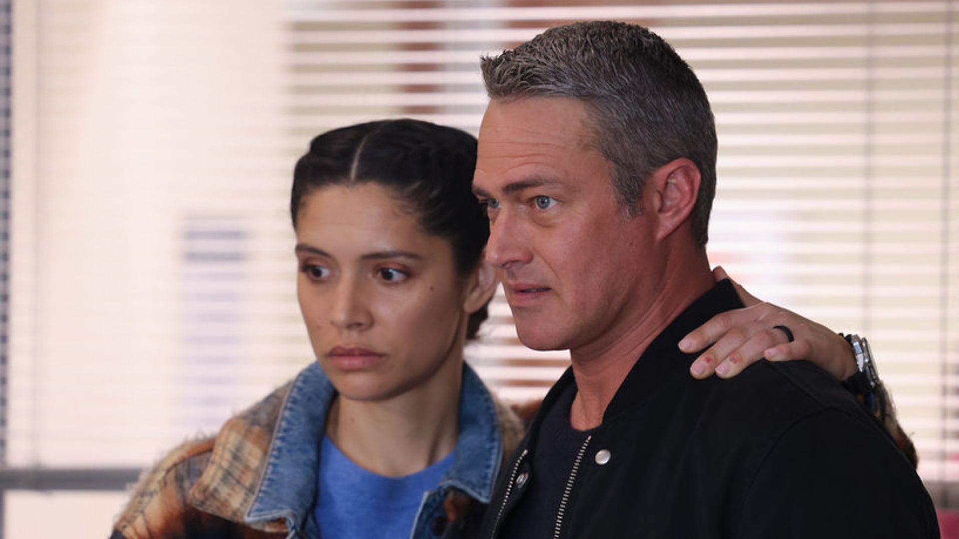 Miranda Rae Mayo as Stella Kidd, Taylor Kinney as Kelly Severide in a still from Chicago Fire