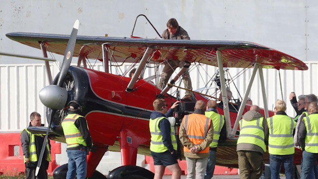 EXCLUSIVE: Hollywood daredevil Tom Cruise was spotted soaring through the skies of Oxfordshire, as he filmed the heart-pounding final scenes for his upcoming blockbuster "Mission: Impossible - Dead Reckoning Part Two". In a jaw-dropping spectacle that has left locals stunned, Cruise, 61, took to the skies in a vintage biplane, engaging in a thrilling aerial dogfight!