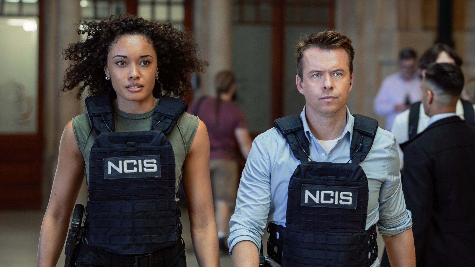 Olivia Swann as NCIS Special Agent Captain Michelle Mackey and Todd Lasance as AFP Liaison Officer Sergeant Jim 'JD' Dempsey in NCIS: Sydney 