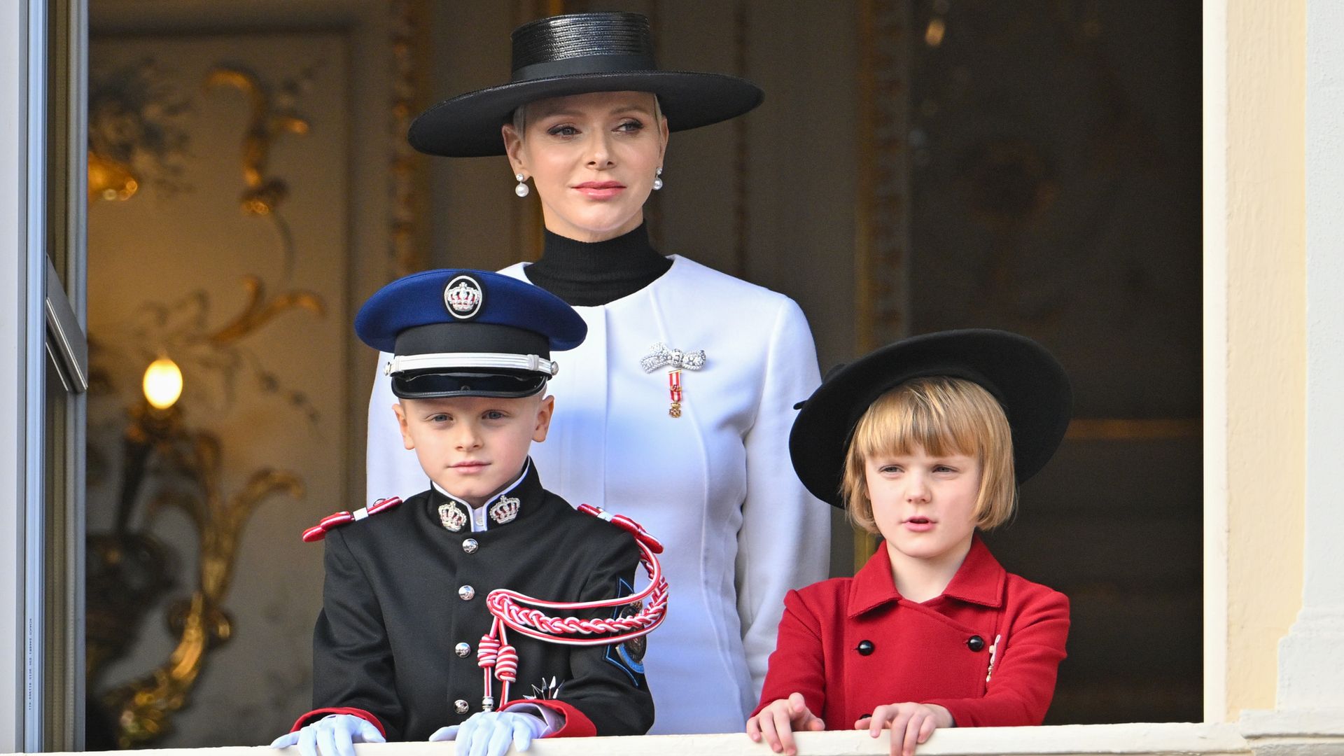 Princess Charlene of Monaco with his children Prince Jacques of Monaco and Princess Gabriella of Monaco appear at the Palace balcony during the Monaco National Day on November 19, 2022 in Monte-Carlo, Monaco