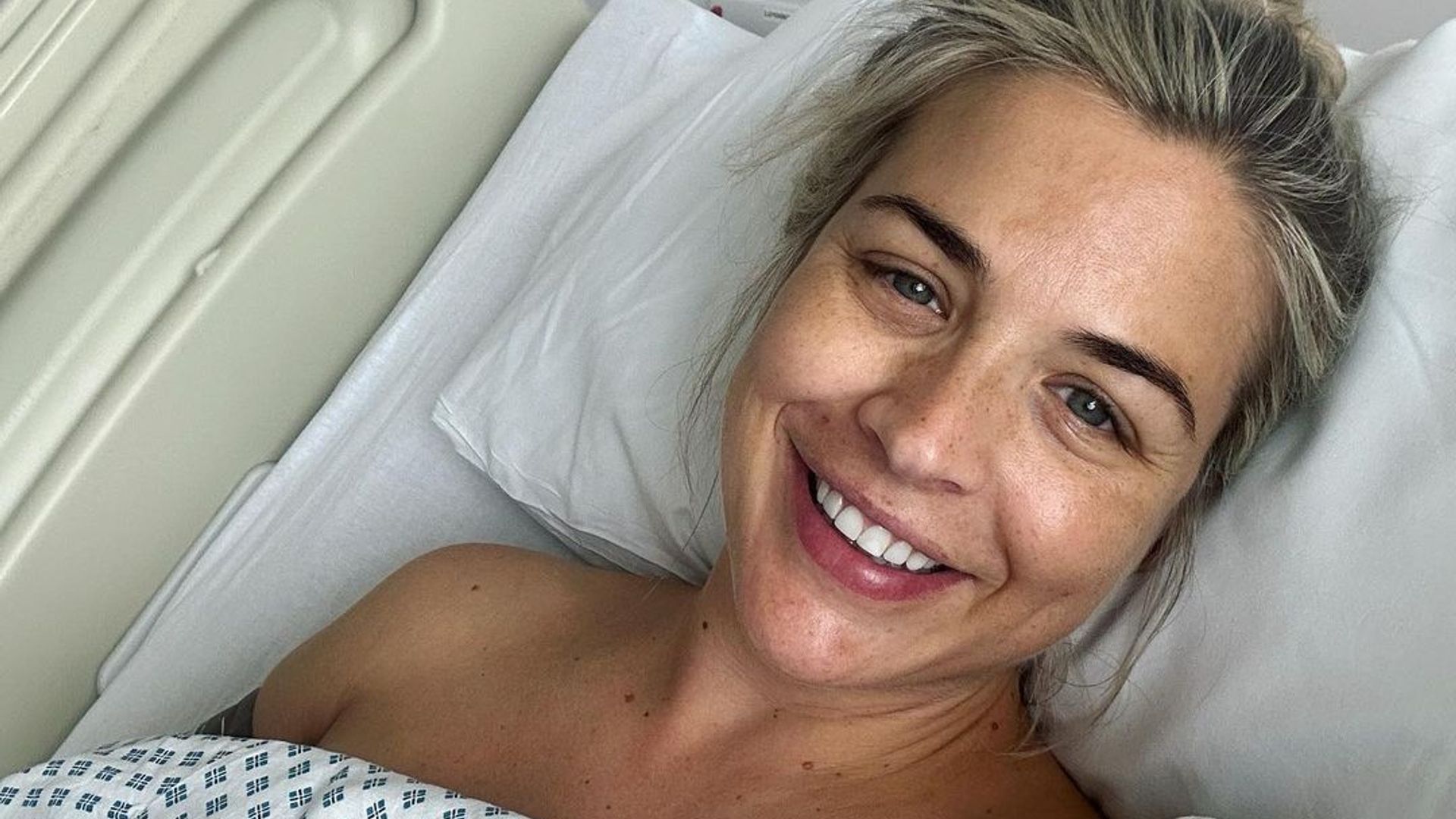 Gemma Atkinson smiling in a hospital bed