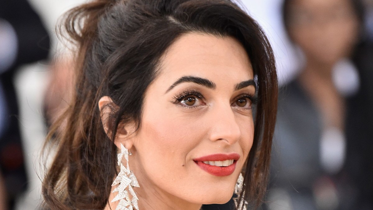 Amal Clooney divides HELLO! readers with style husband George brands 'eccentric'