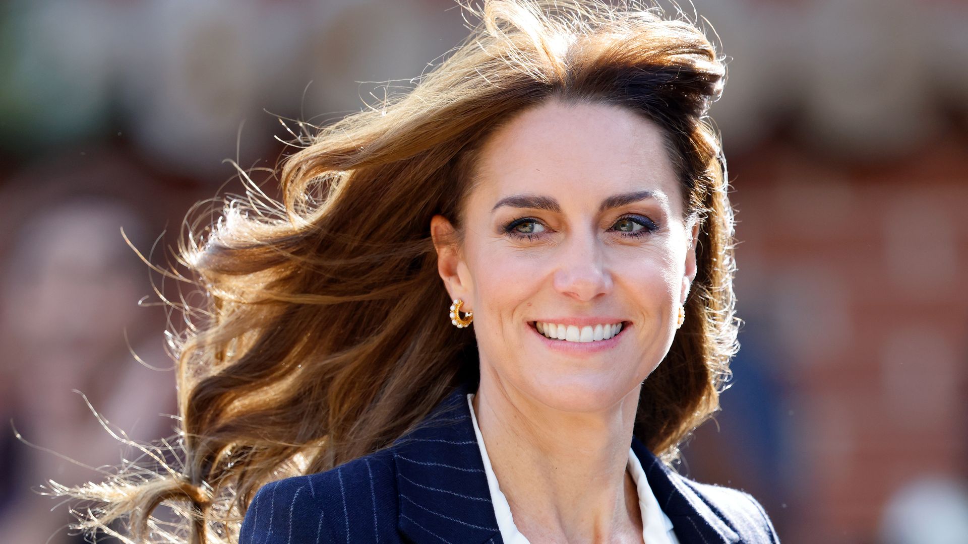 Princess Kate lights up the room with new makeup look and tumbling autumnal hair