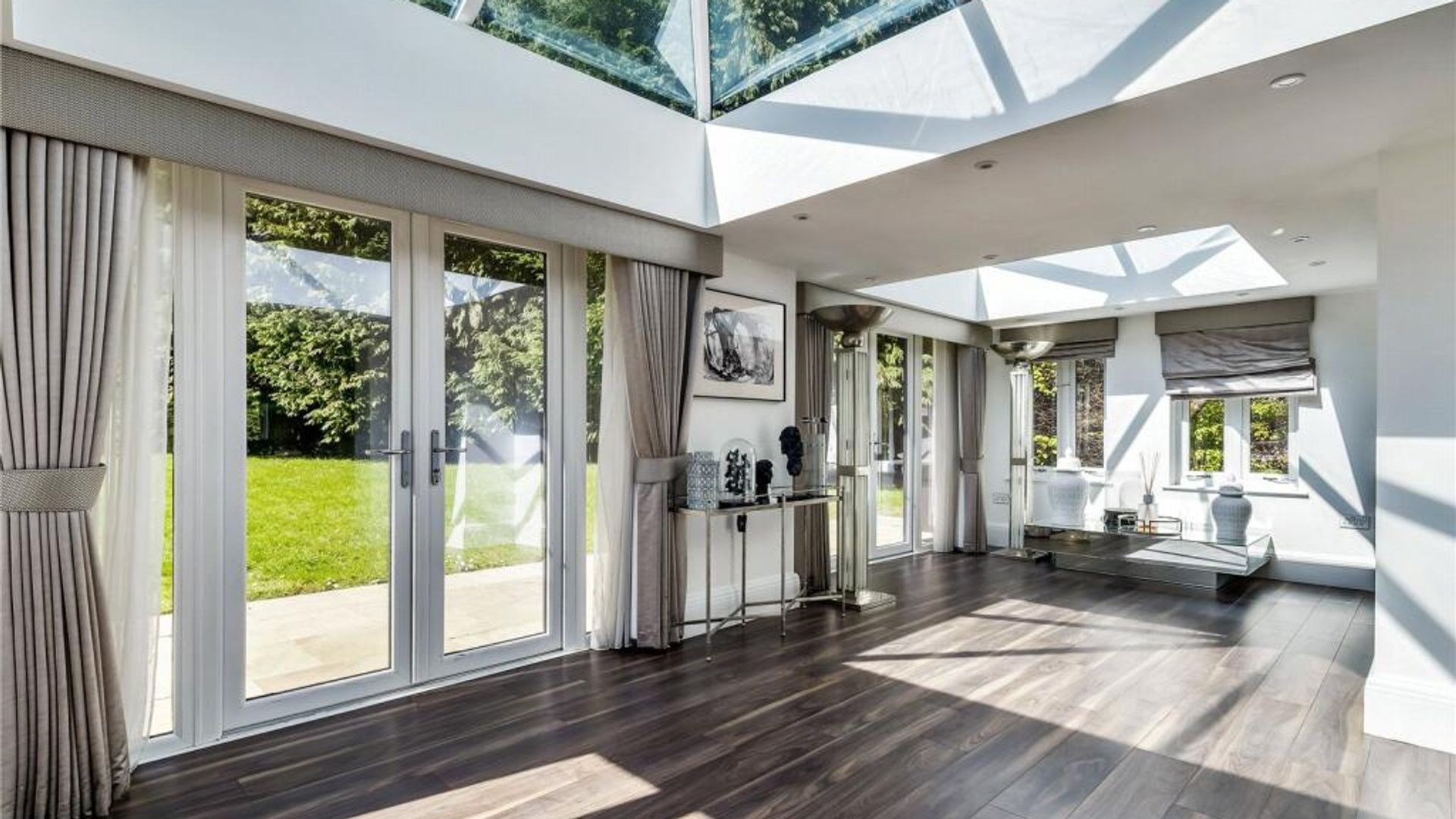 A conservatory featuring ornaments and a wooden floor