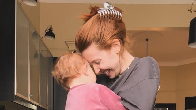 mother with daughter in kitchen