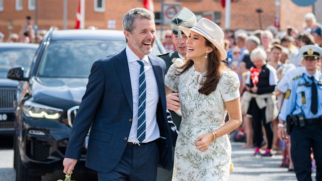 King Frederik and Queen Mary laugh in Grasten