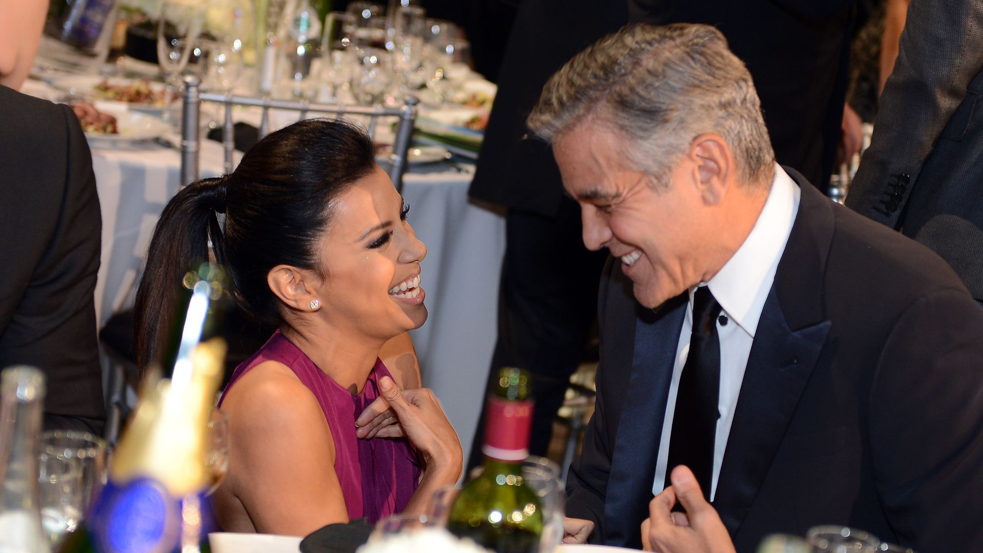 Eva Longoria and George Clooney laughing together