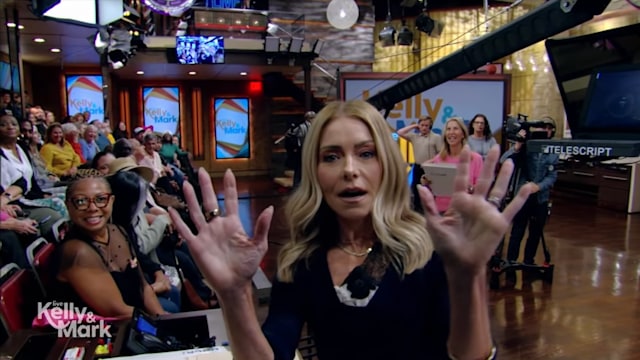 Kelly Ripa in the Live studios leaving her seat 