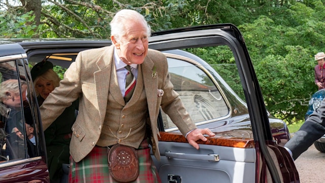 King Charles III wearing a kilt and getting out of the car at Crathie Church, Balmoral on September 3, 2023 