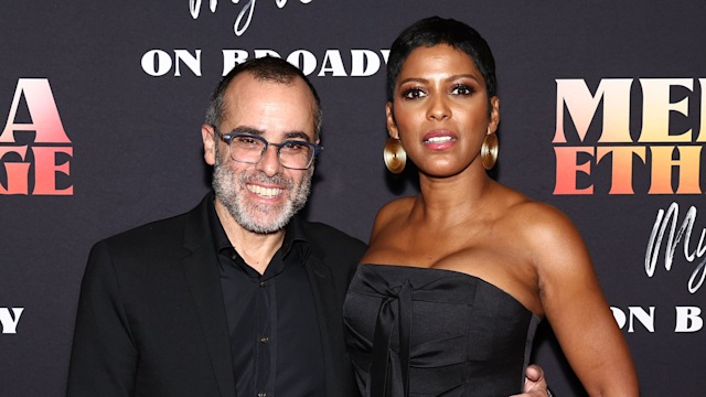 Steven Greener and his wife Tamron Hall pose for the cameras