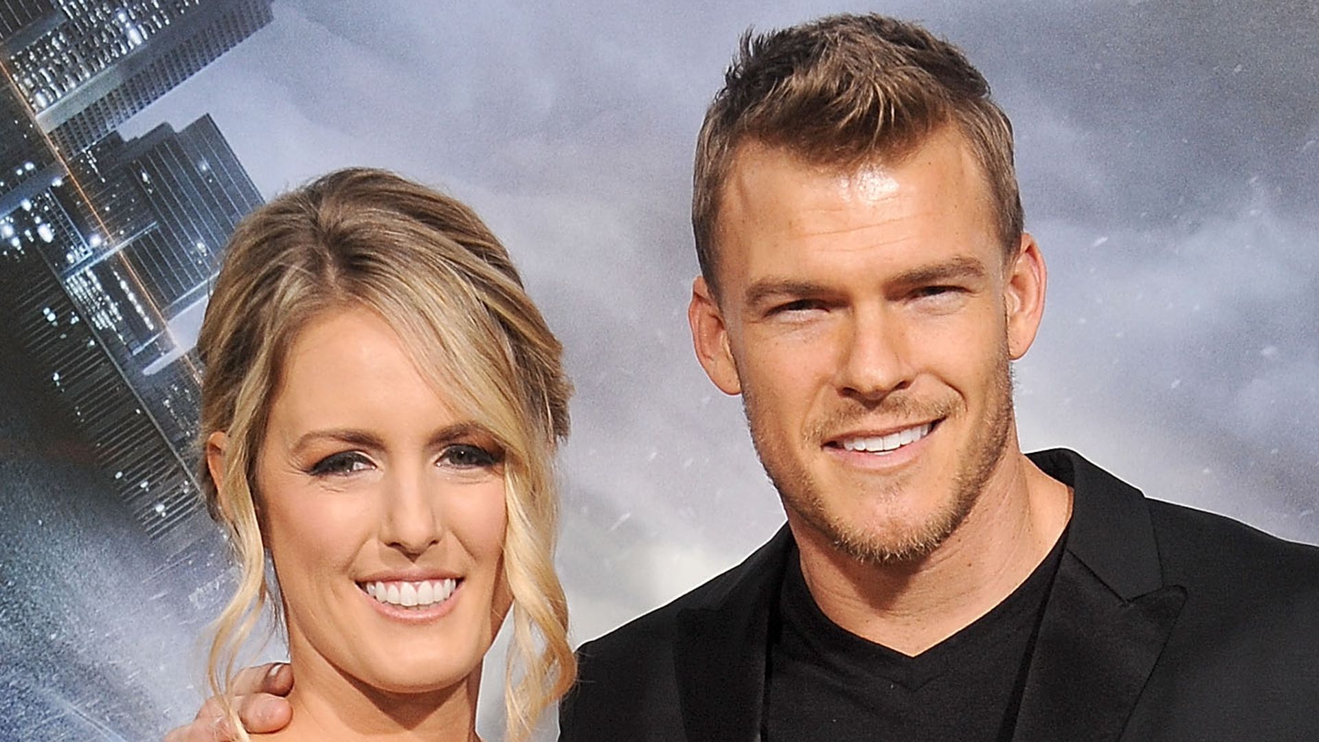 Alan Ritchson and wife Catherine posing red carpet