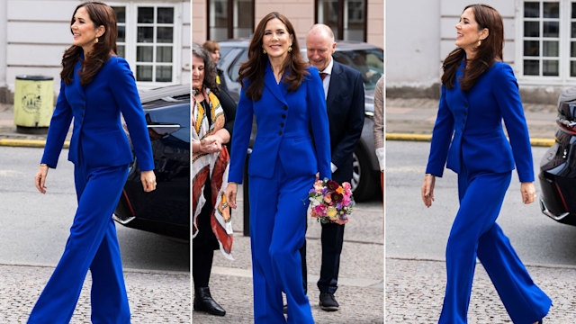 Queen Mary wearing cobalt blue trouser suit