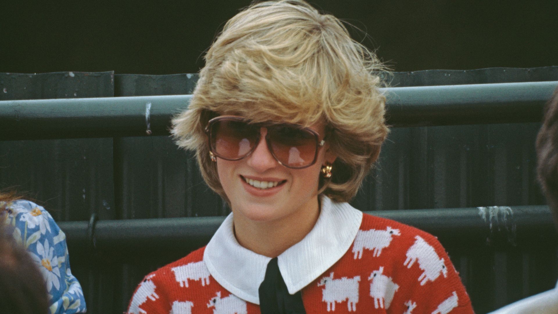 Princess Diana wearing red sheep jumper 