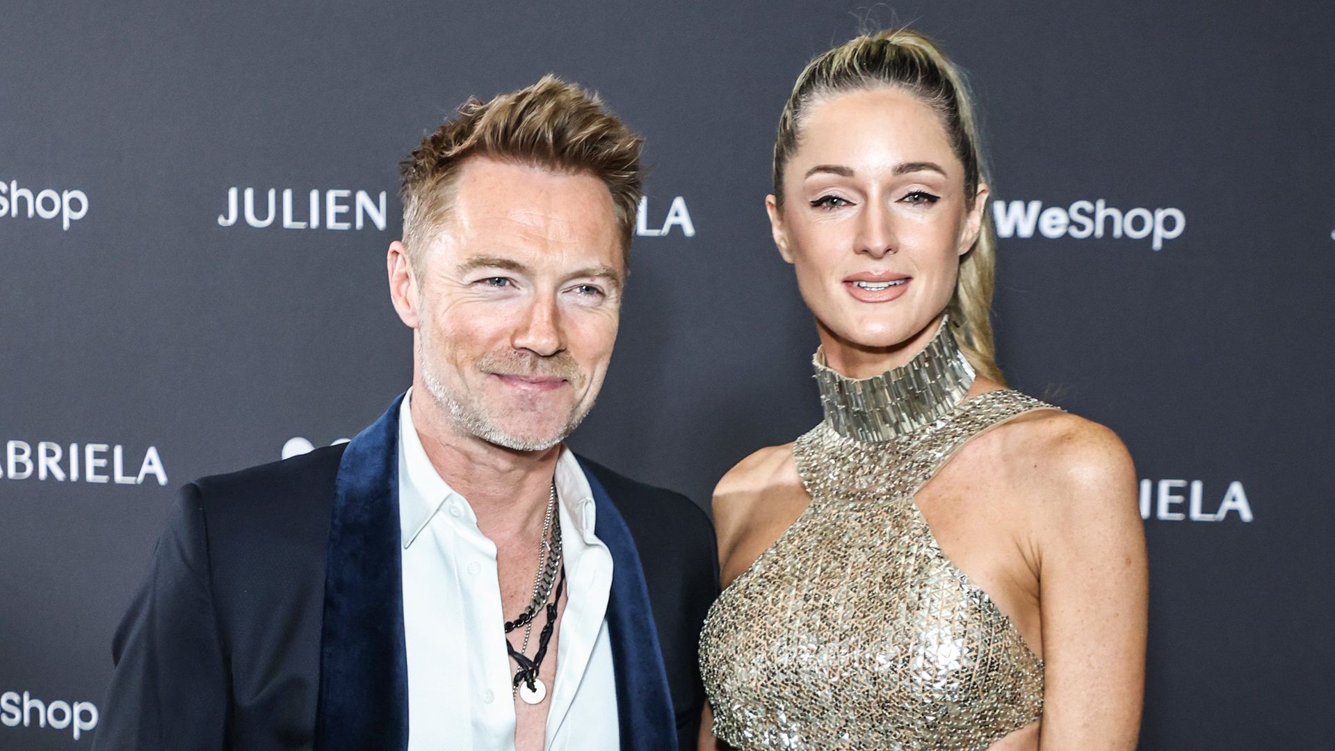 Ronan Keating stood with his wife Storm