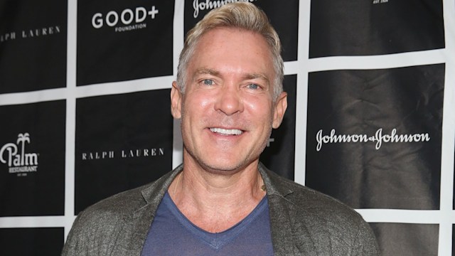 Sam Champion smiling on a red carpet