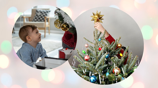 baby looking at christmas tree