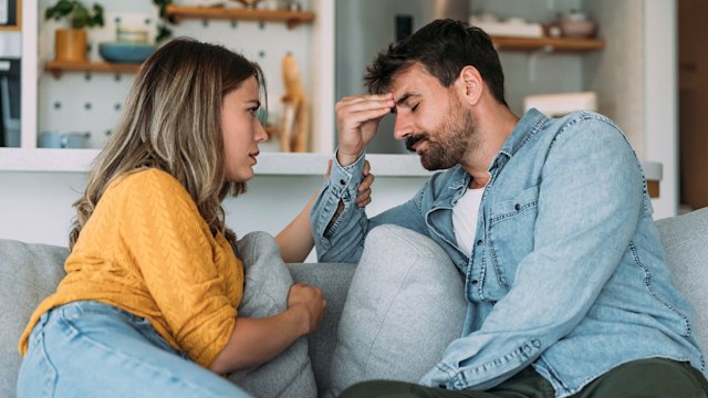 Wife expressing empathy and compassion to her sad husband