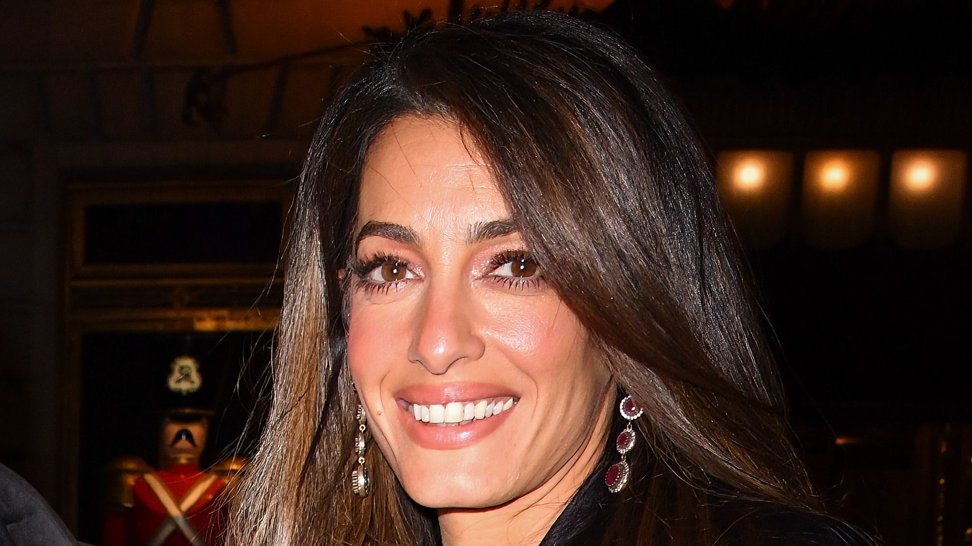 Amal Clooney makes a splash as she arrives at Venice party in stunning mermaid-inspired gown