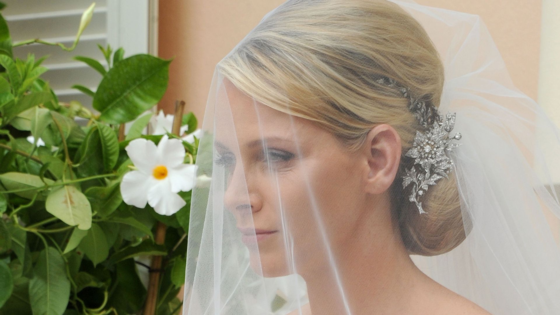 Princess Charlene's shoulder-flashing wedding dress took 2,500 hours to make – see photos